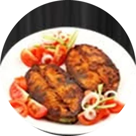 Kerala-style fish fry with onions and tomato
